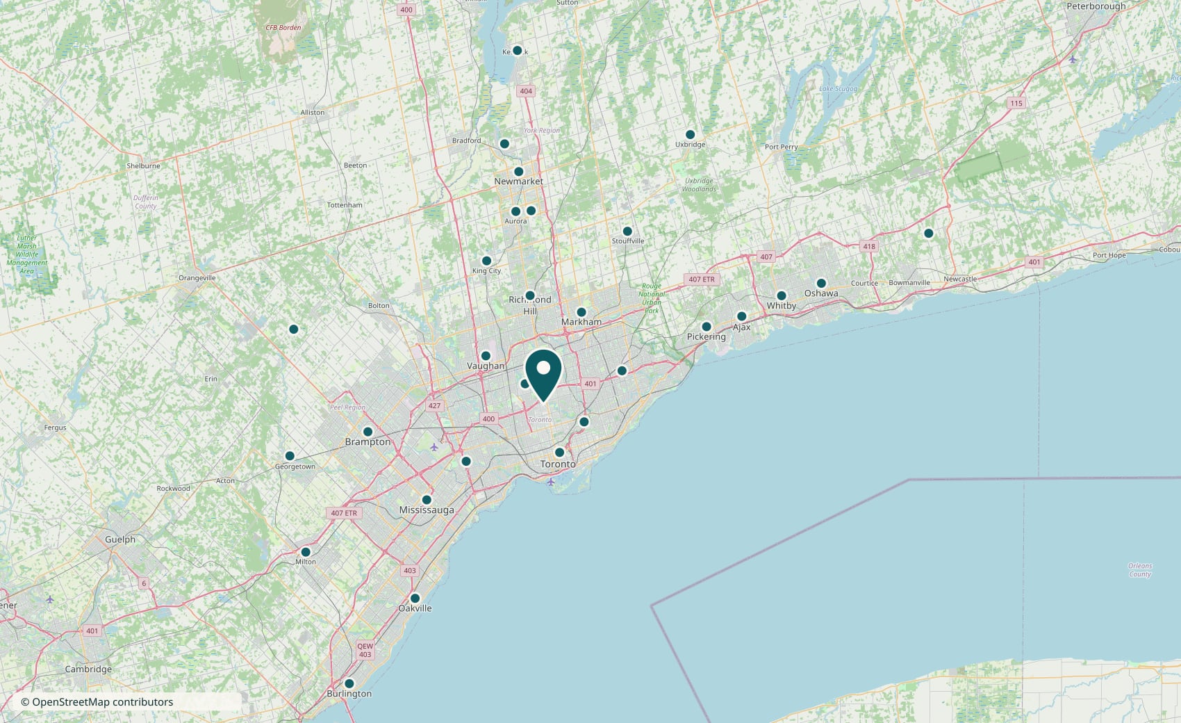 Map of the Greater Toronto Area with a marker on each of the 28 communities we clean in, from Burlington in the west to Clarington in the east and Georgina in the north. A larger pin marks our office at Yonge and Sheppard.